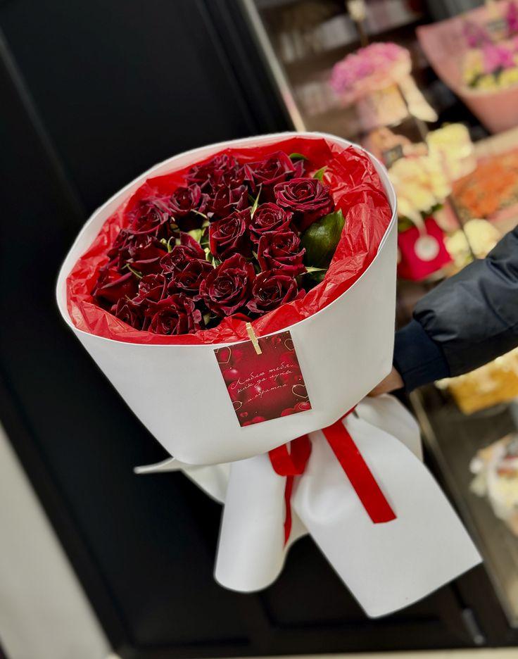 DomainBoldLedger workshop space where corporate flower arrangements are designed and prepared for business delivery